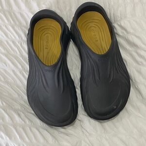 CROCS Black and Gold Clogs
